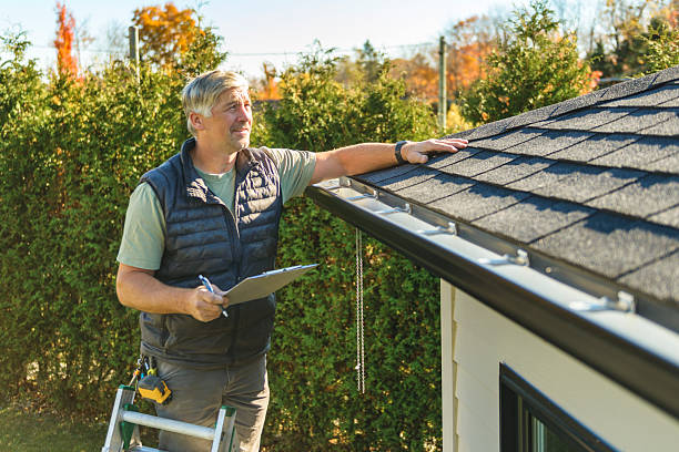 Professional Hail Damage Roof Repair technician working in Reading, MI